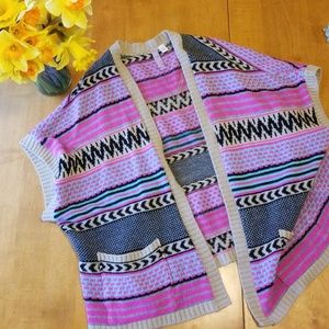 Pink, tan, black and blue sweater